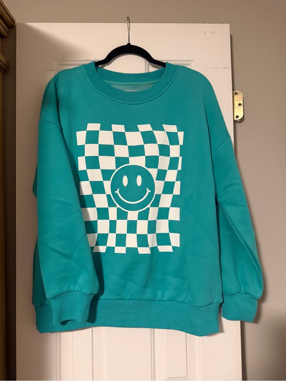 Women’s Teal Crewneck Sweatshirt with White Checker Smiley Print